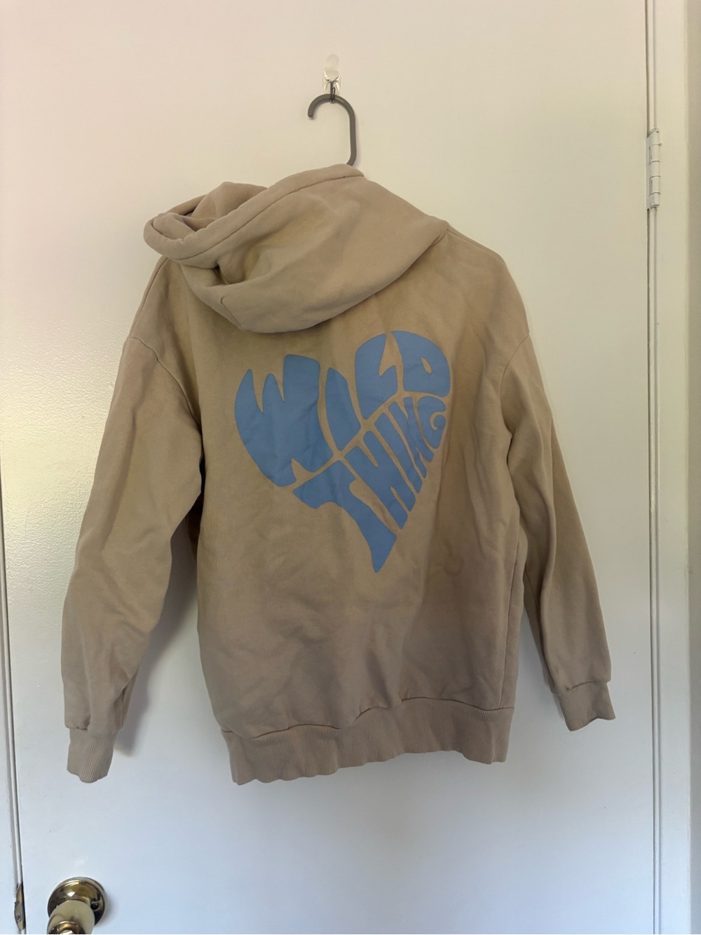 Subdued Beige Hoodie with Blue Heart Graphic